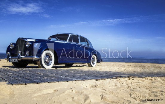 Picture of Beautiful blue retro car on the coast